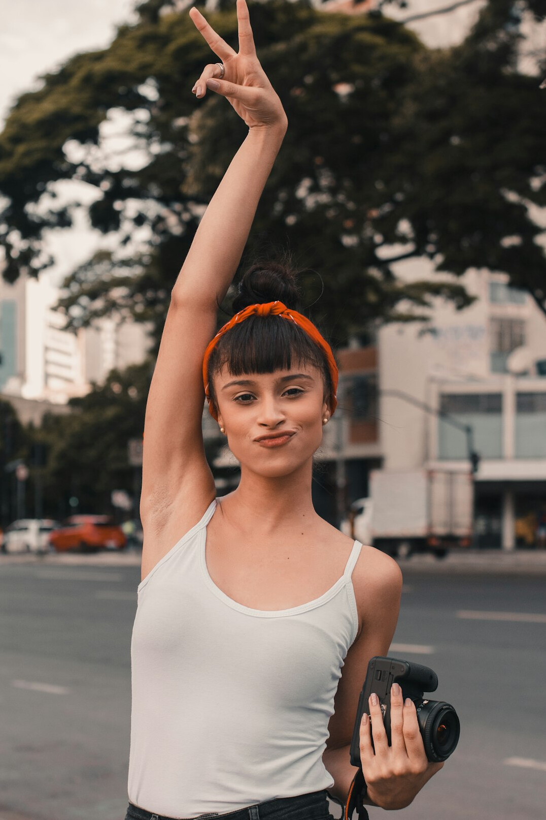 Asian Brazilian woman instructor with short hair