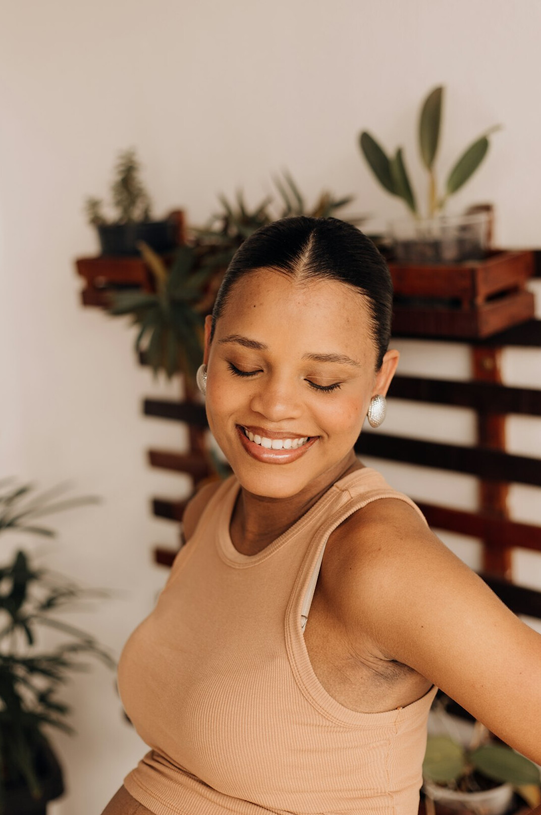 Brazilian woman instructor with dark hair smiling softly